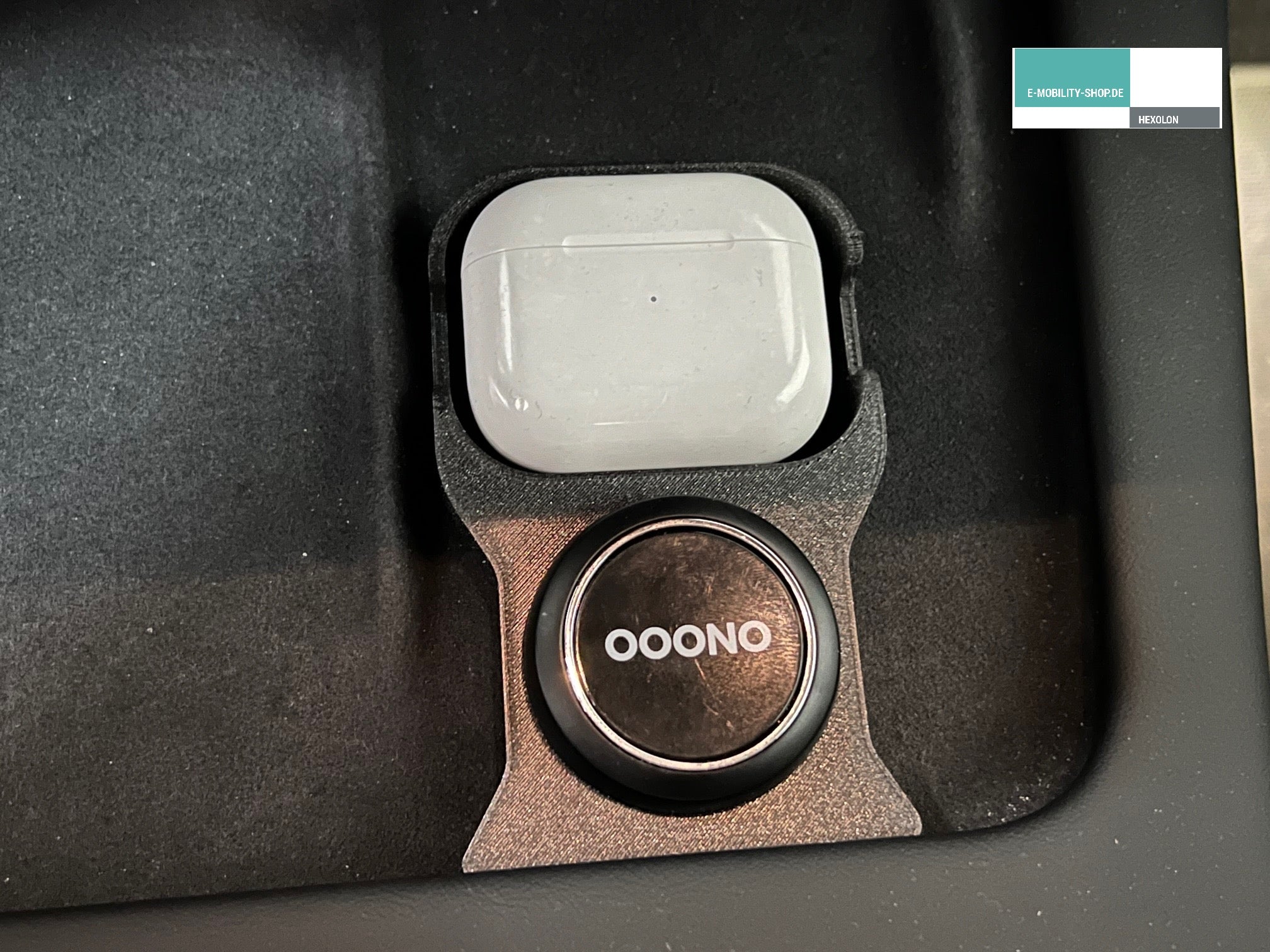 AirPods holder for the inductive charging cradle in the Tesla with OOONO  mounting option